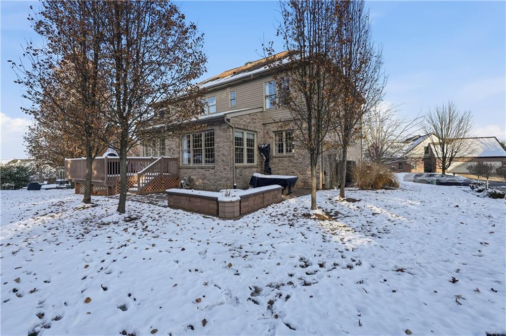 2017 Condor Lane Gibsonia, PA 15044 - Photo 45 of 49 a front view of a house with a yard covered with snow
