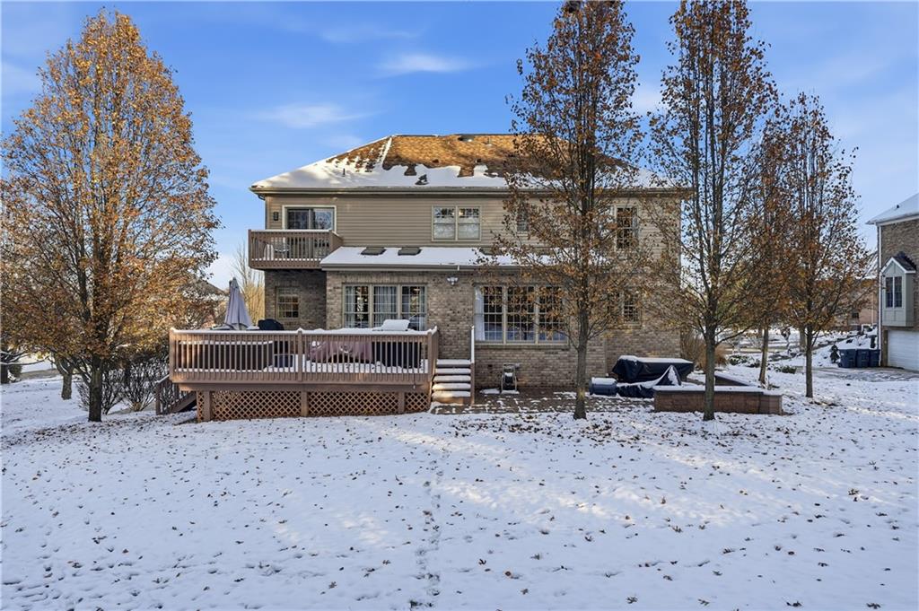 2017 Condor Lane Gibsonia, PA 15044 - Photo 47 of 49 a front view of a house with a yard covered with snow in the background