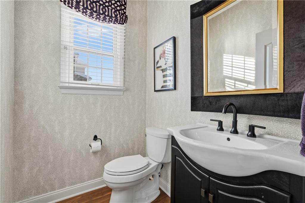 2017 Condor Lane Gibsonia, PA 15044 - Photo 5 of 49 a bathroom with a sink a toilet and a window
