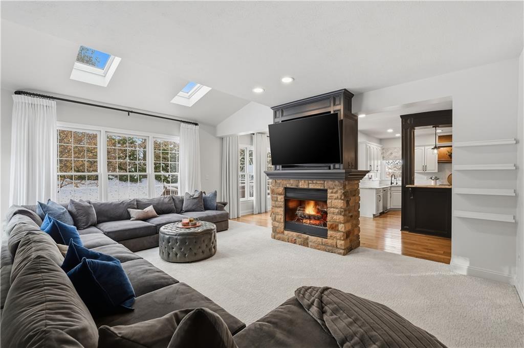 2017 Condor Lane Gibsonia, PA 15044 - Photo 9 of 49 a living room with fireplace furniture and a flat screen tv