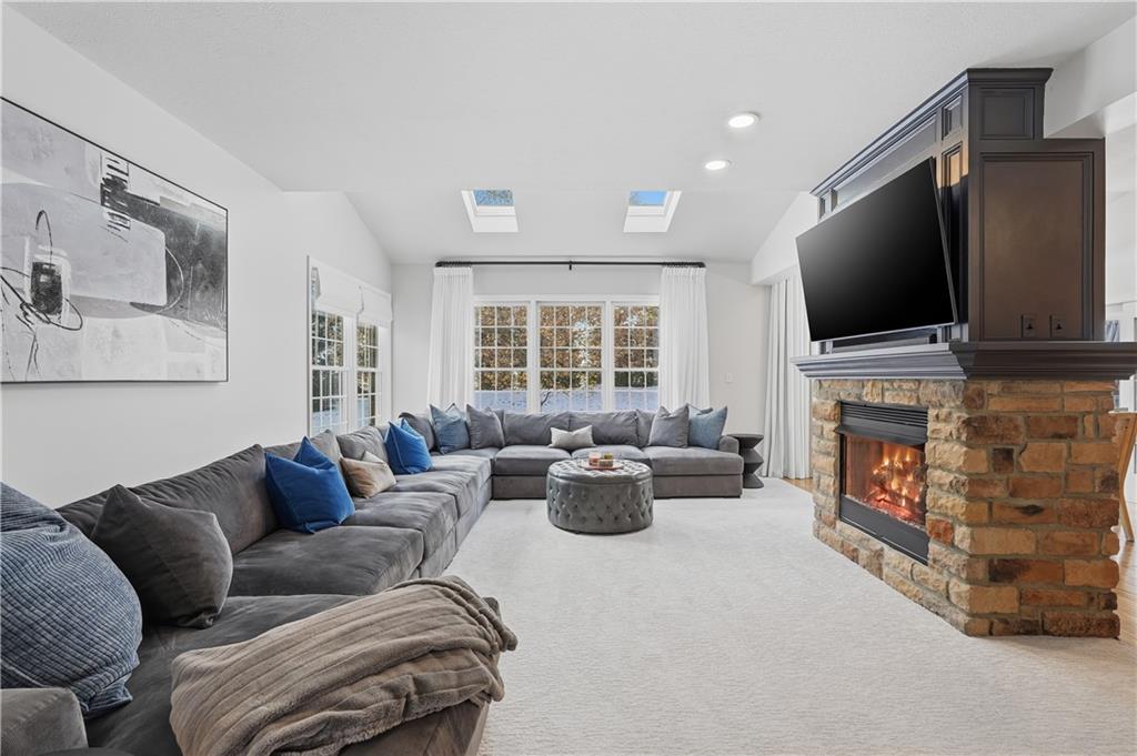 2017 Condor Lane Gibsonia, PA 15044 - Photo 10 of 49 a living room with fireplace furniture and a flat screen tv