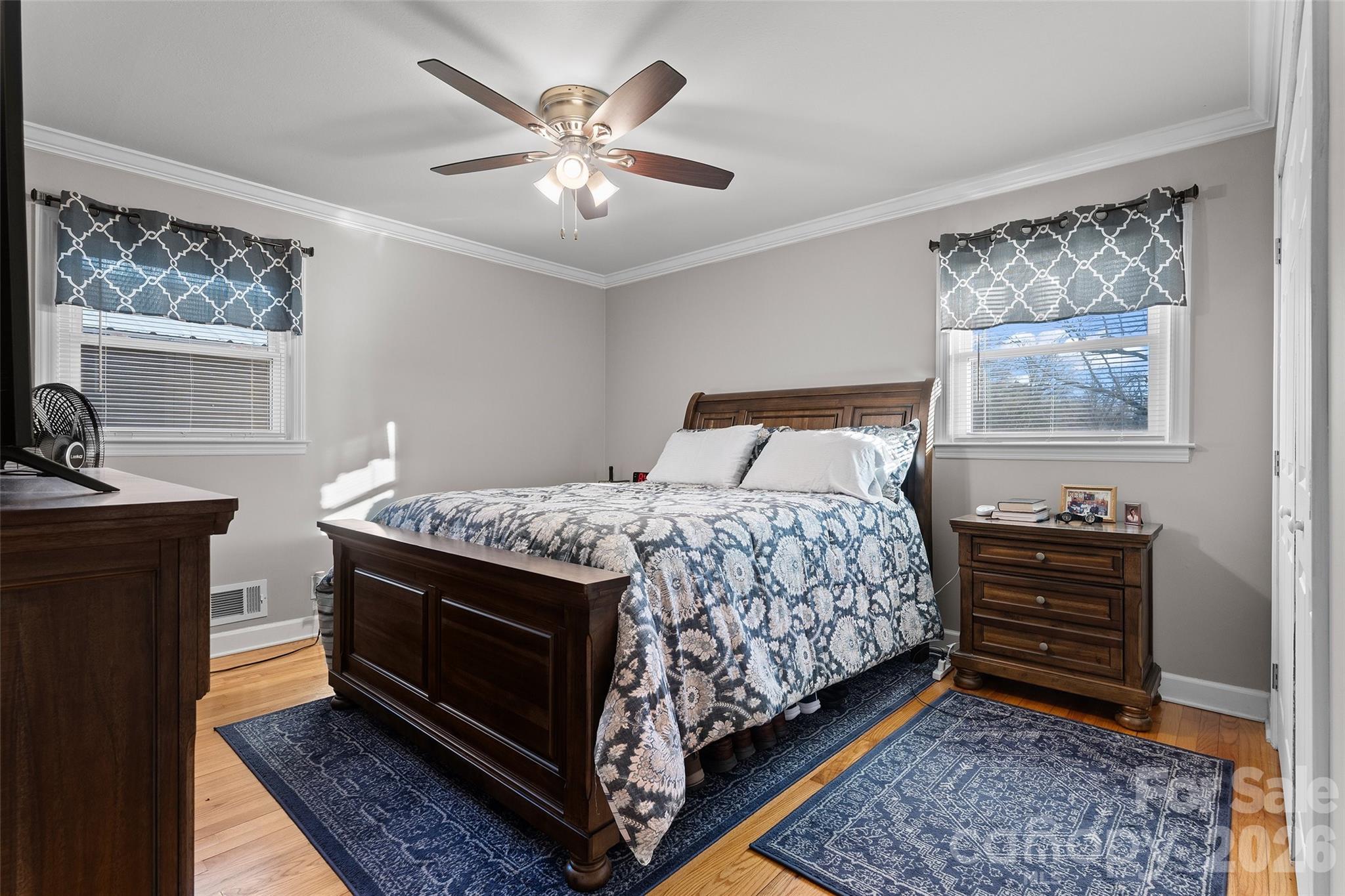 871 Saluda Road Chester, SC 29706 - Photo 27 of 46 a bedroom with a bed and a chandelier