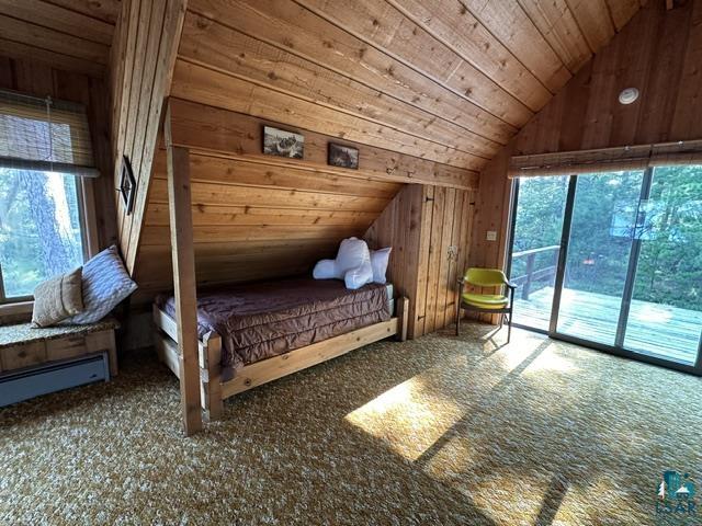 2763 Van Vac Road Ely, MN 55731 - Photo 20 of 37 Wood-paneled room featuring vaulted ceilings and a built-in bed frame