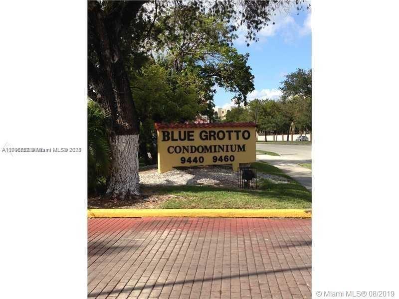 a view of front door of house with yard