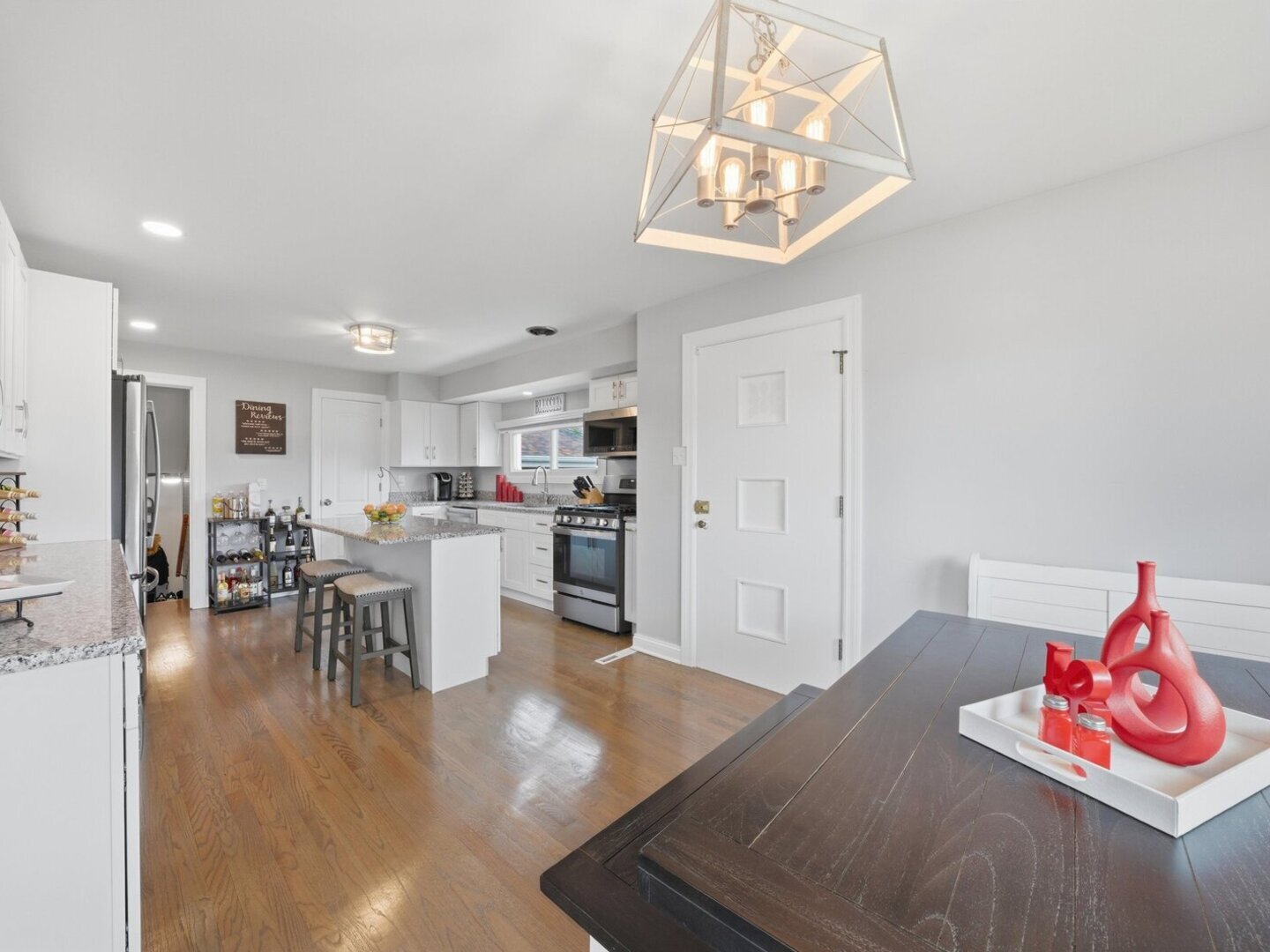 18441 Marshfield Avenue Homewood, IL 60430 - Photo 15 of 49 a living room with furniture and a kitchen view