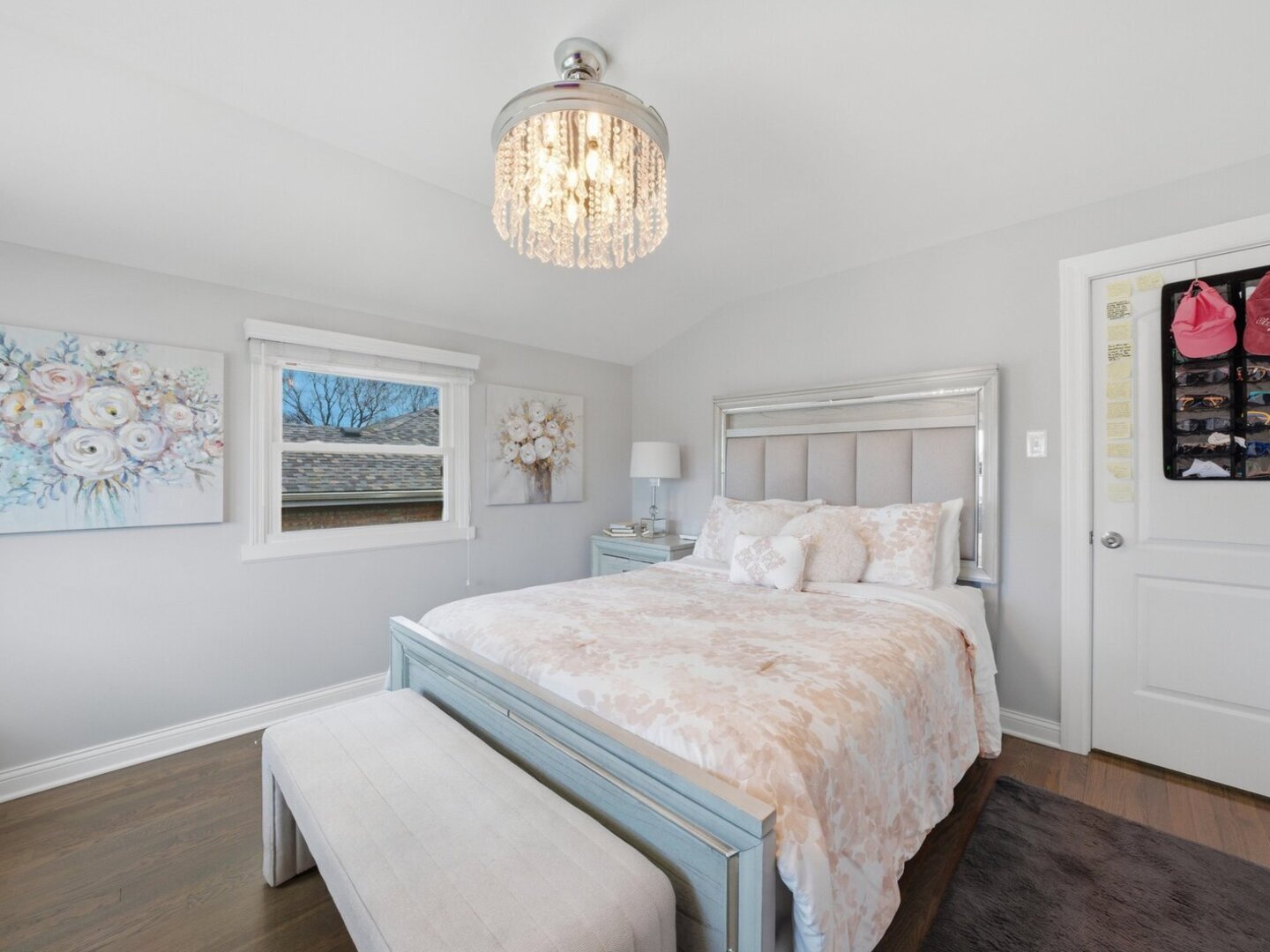 18441 Marshfield Avenue Homewood, IL 60430 - Photo 19 of 49 a bedroom with a bed and a chandelier