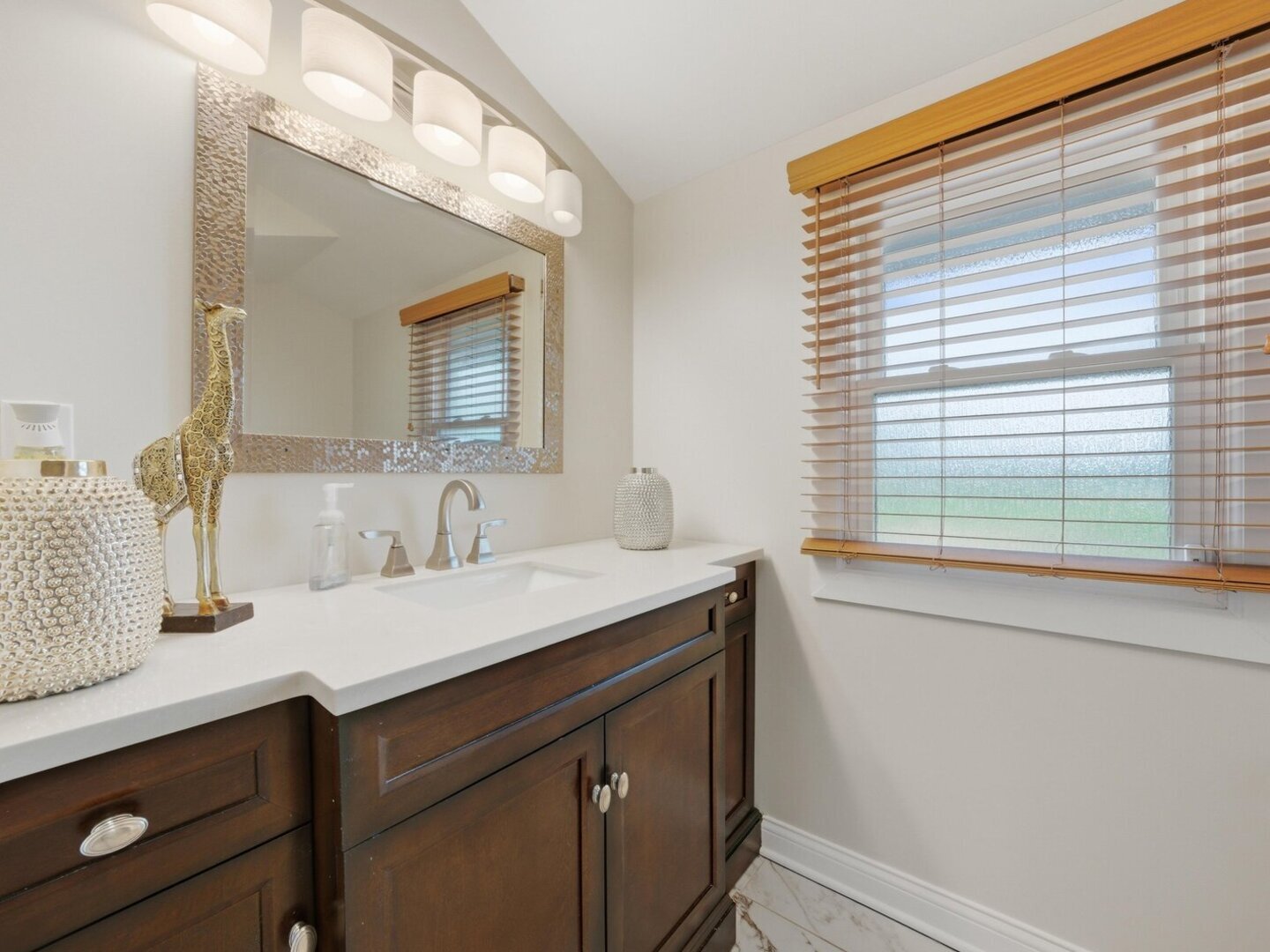 18441 Marshfield Avenue Homewood, IL 60430 - Photo 25 of 49 a bathroom with a sink and a mirror