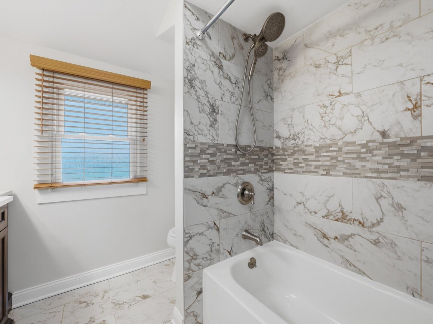 18441 Marshfield Avenue Homewood, IL 60430 - Photo 26 of 49 a bathroom with a bathtub and shower