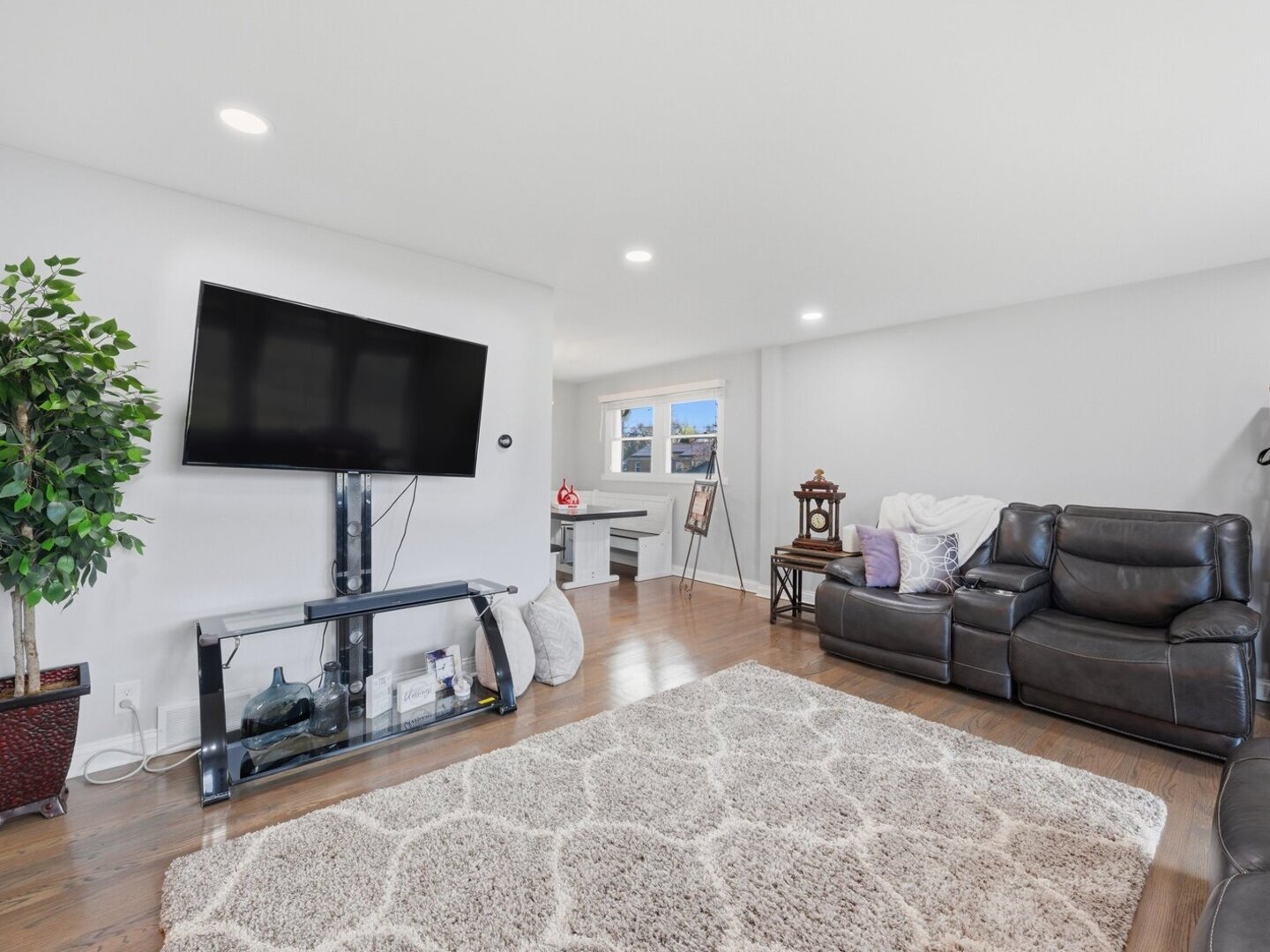 18441 Marshfield Avenue Homewood, IL 60430 - Photo 9 of 49 a living room with furniture and a flat screen tv