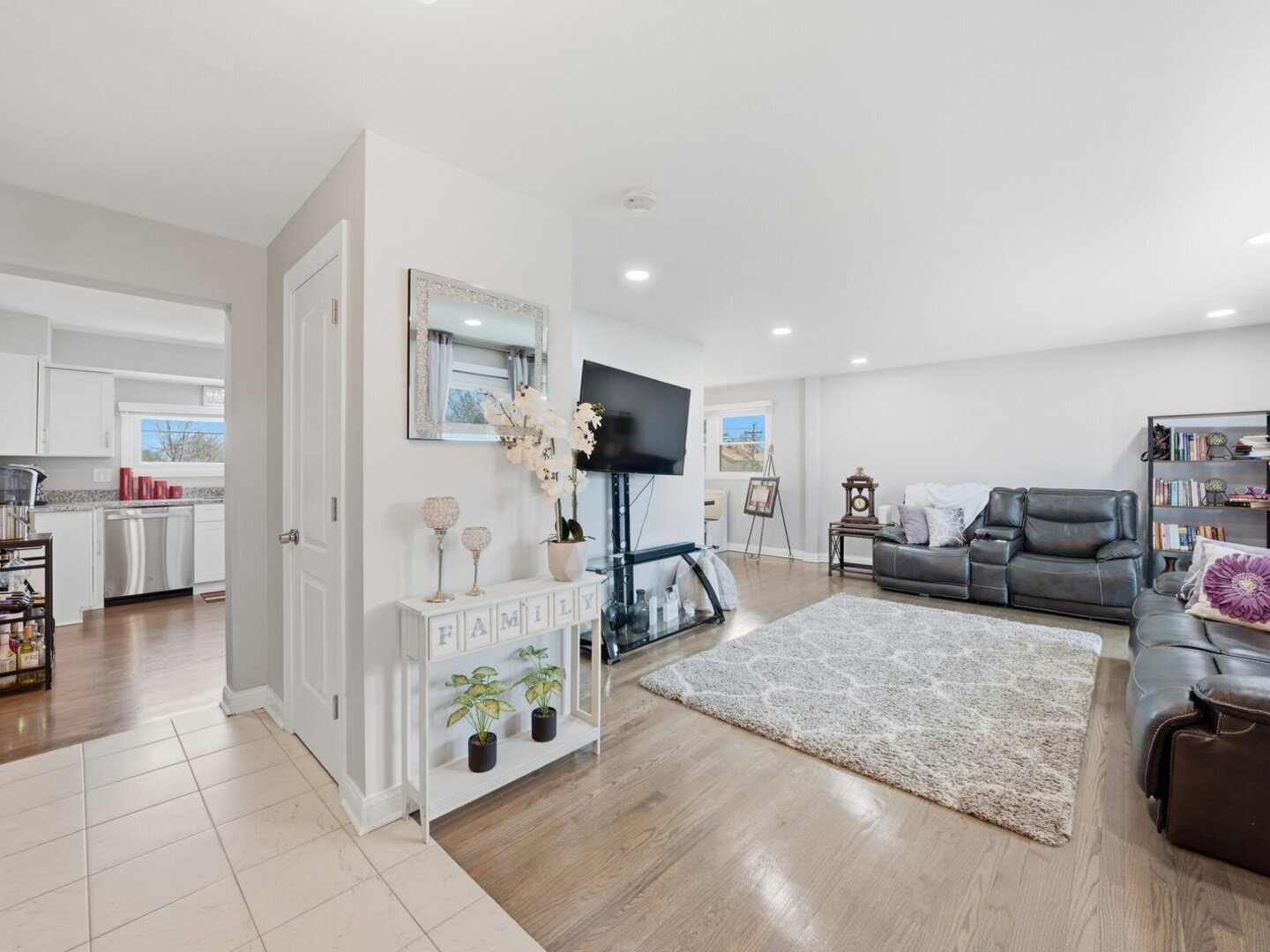18441 Marshfield Avenue Homewood, IL 60430 - Photo 10 of 49 a living room with furniture and a flat screen tv