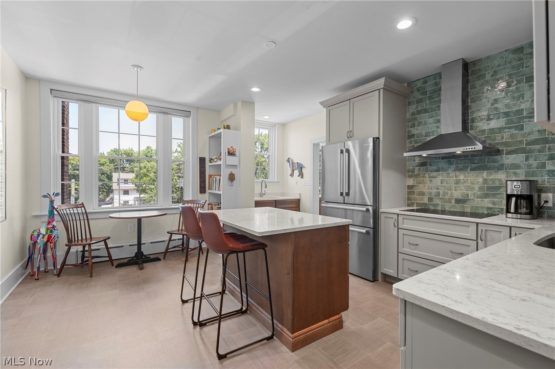 12546 Cedar Road, Unit 4 Cleveland Heights, OH 44106 - Photo 5 of 43 Newer windows, gourmet Kitchen taken down to the studs with center island and breakfast bar, 2 sinks, quartz counters, all Bosch stainless appliances with induction range and 2 ovens for large gatherings
