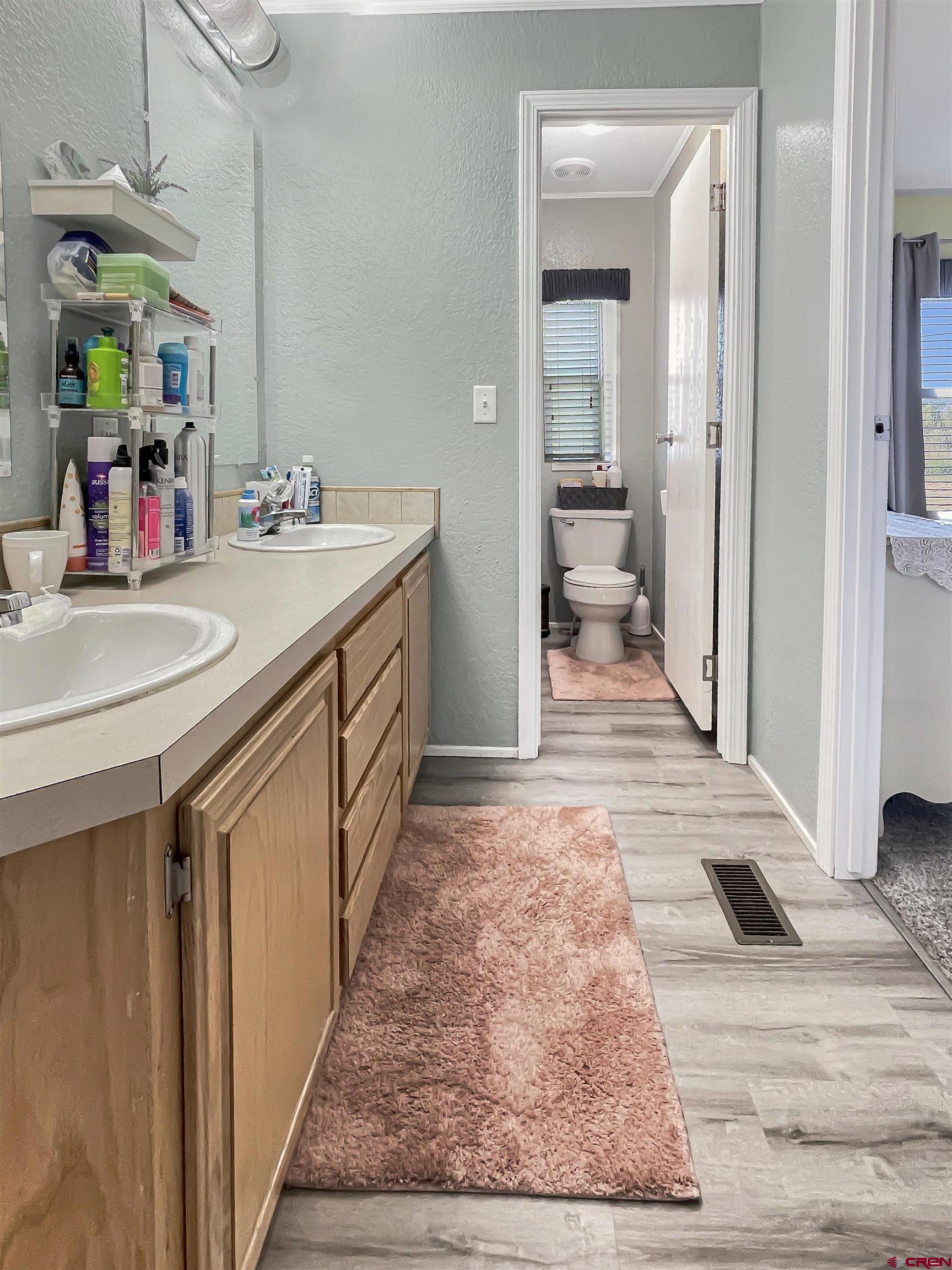 21043 Road C 7 Cortez Co 81321 Cortez, CO 81321 - Photo 21 of 40 a bathroom with a sink and a mirror