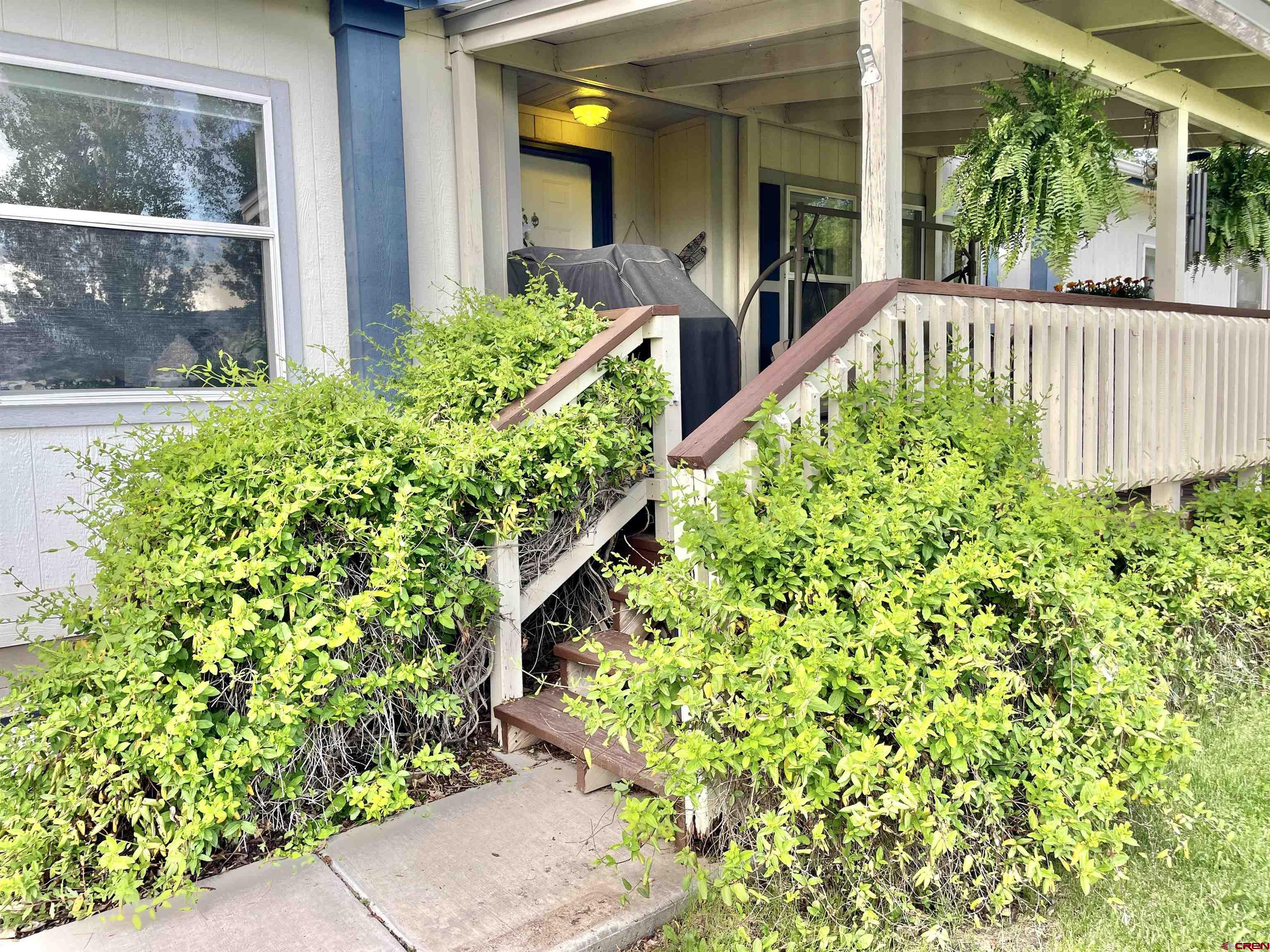 21043 Road C 7 Cortez Co 81321 Cortez, CO 81321 - Photo 3 of 40 a view of a garden with pathway