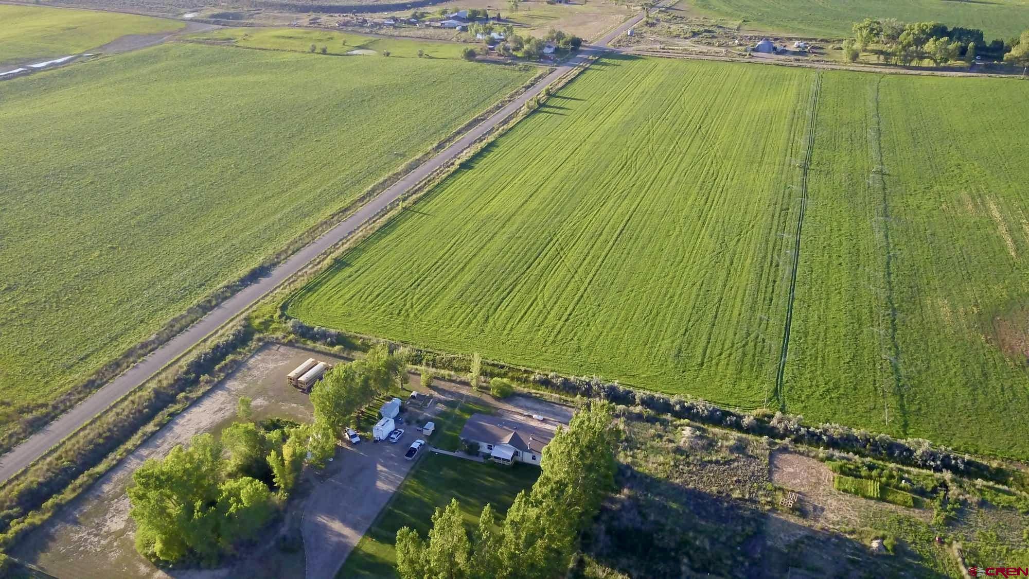 21043 Road C 7 Cortez Co 81321 Cortez, CO 81321 - Photo 39 of 40 a view of a swimming pool with a yard
