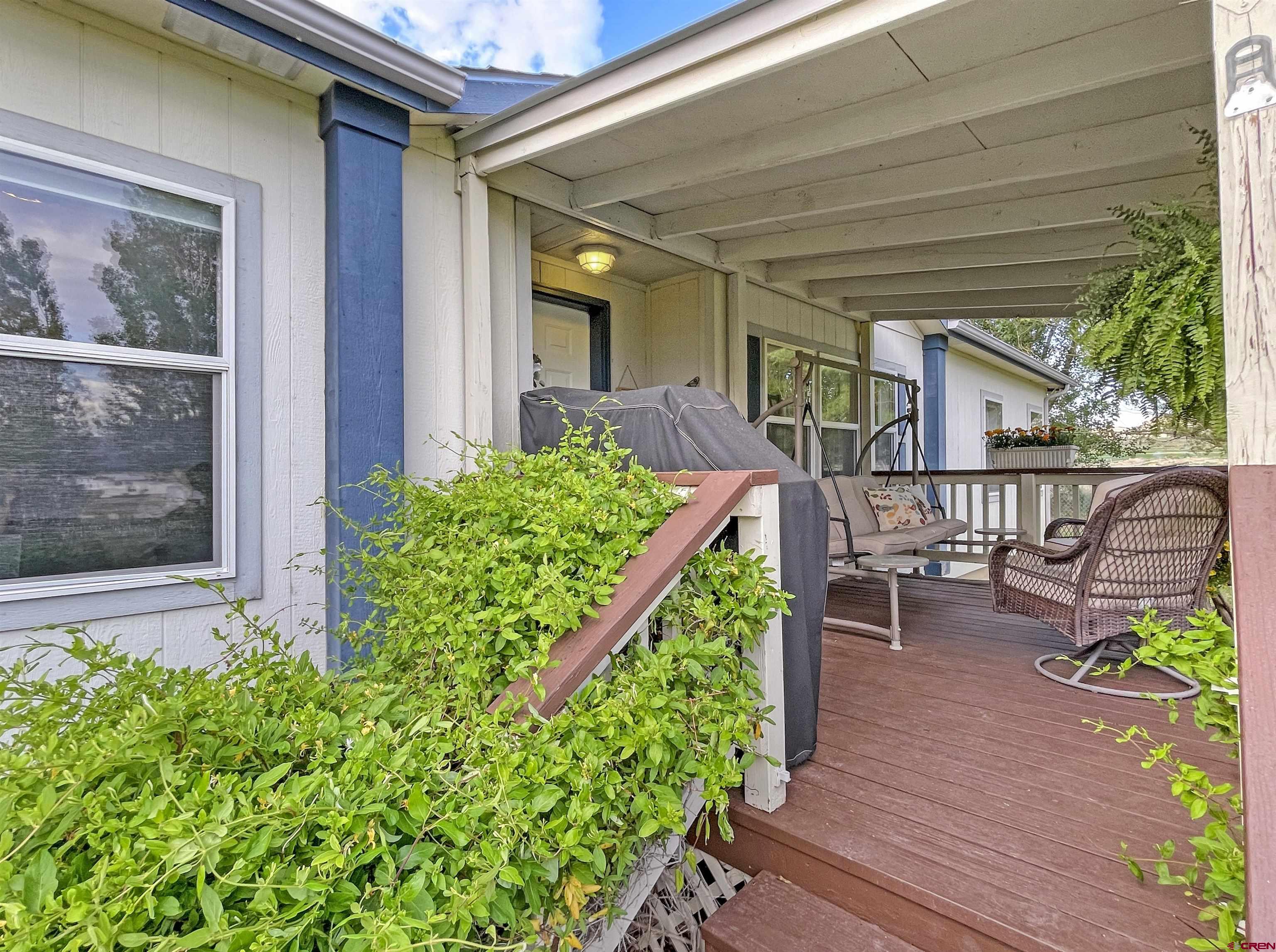 21043 Road C 7 Cortez Co 81321 Cortez, CO 81321 - Photo 4 of 40 a garden view with a seating space