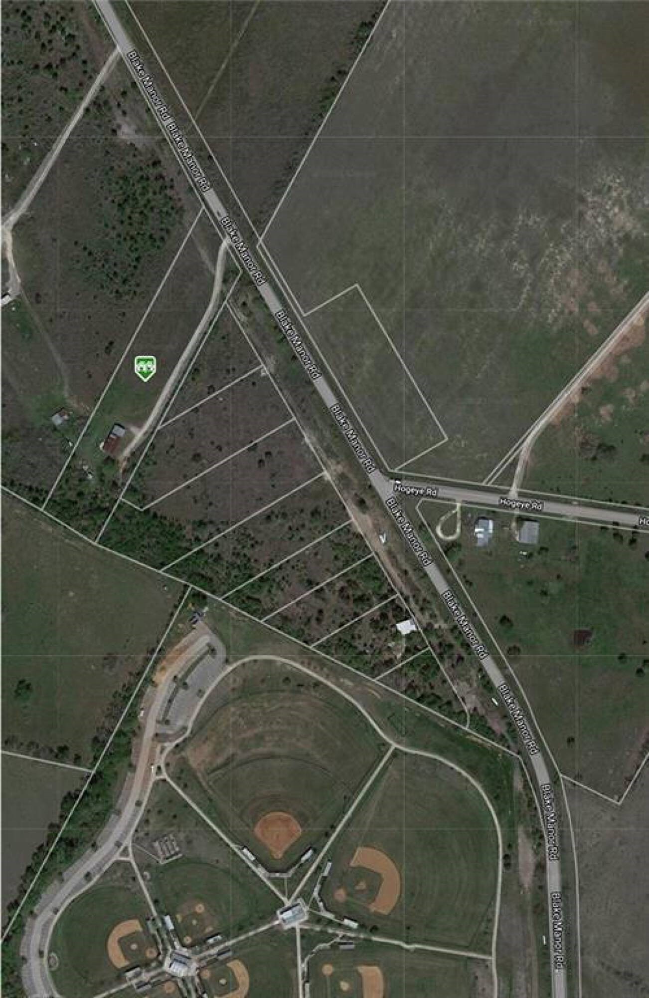 18501 Blake Manor Road Manor, TX 78653 - Photo 9 of 11 a water heater on a wall