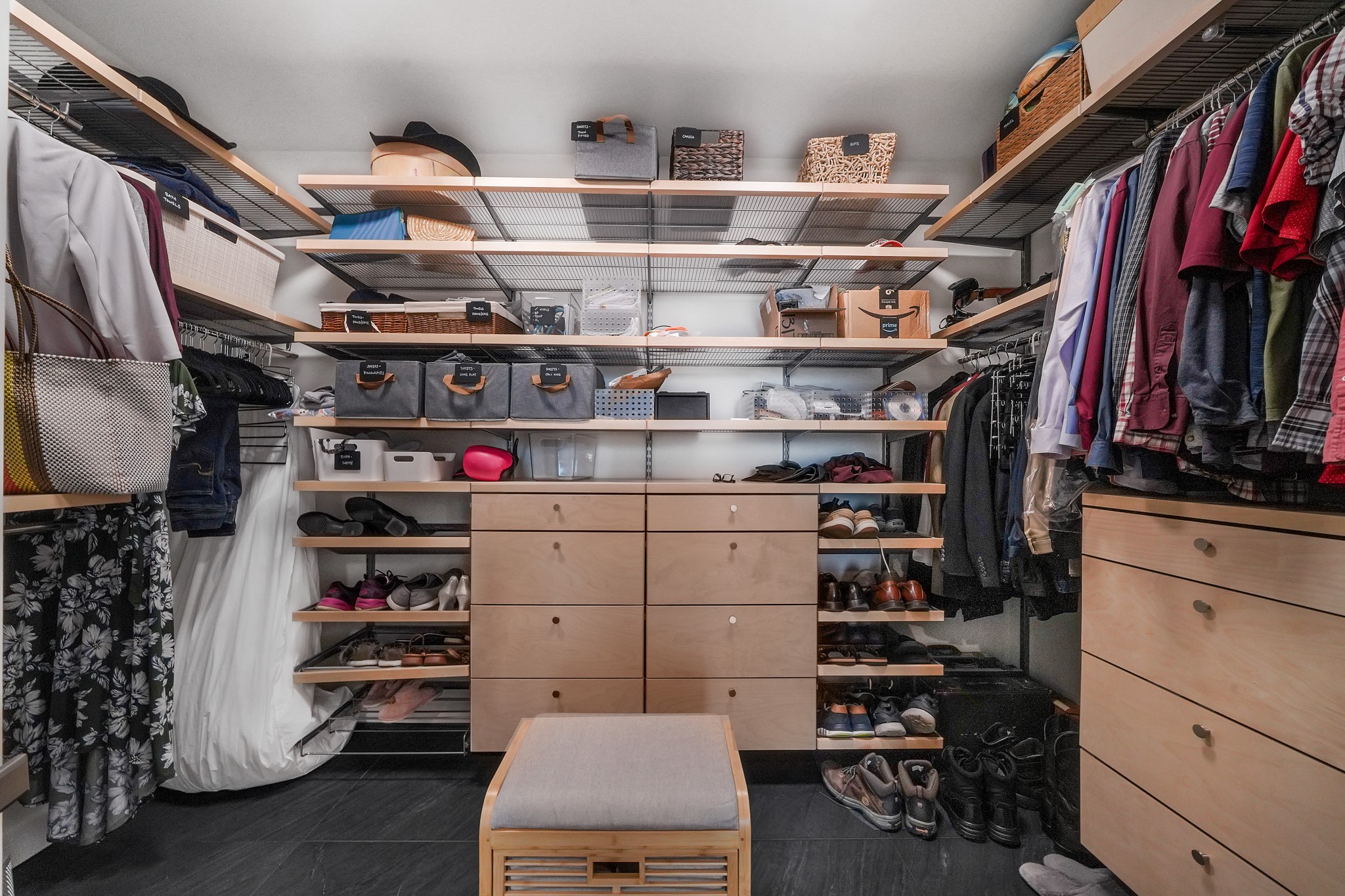 5925 Almeda Road, Unit 11317 Houston, TX 77004 - Photo 16 of 38 a view of walk in closet with clothes and shoes