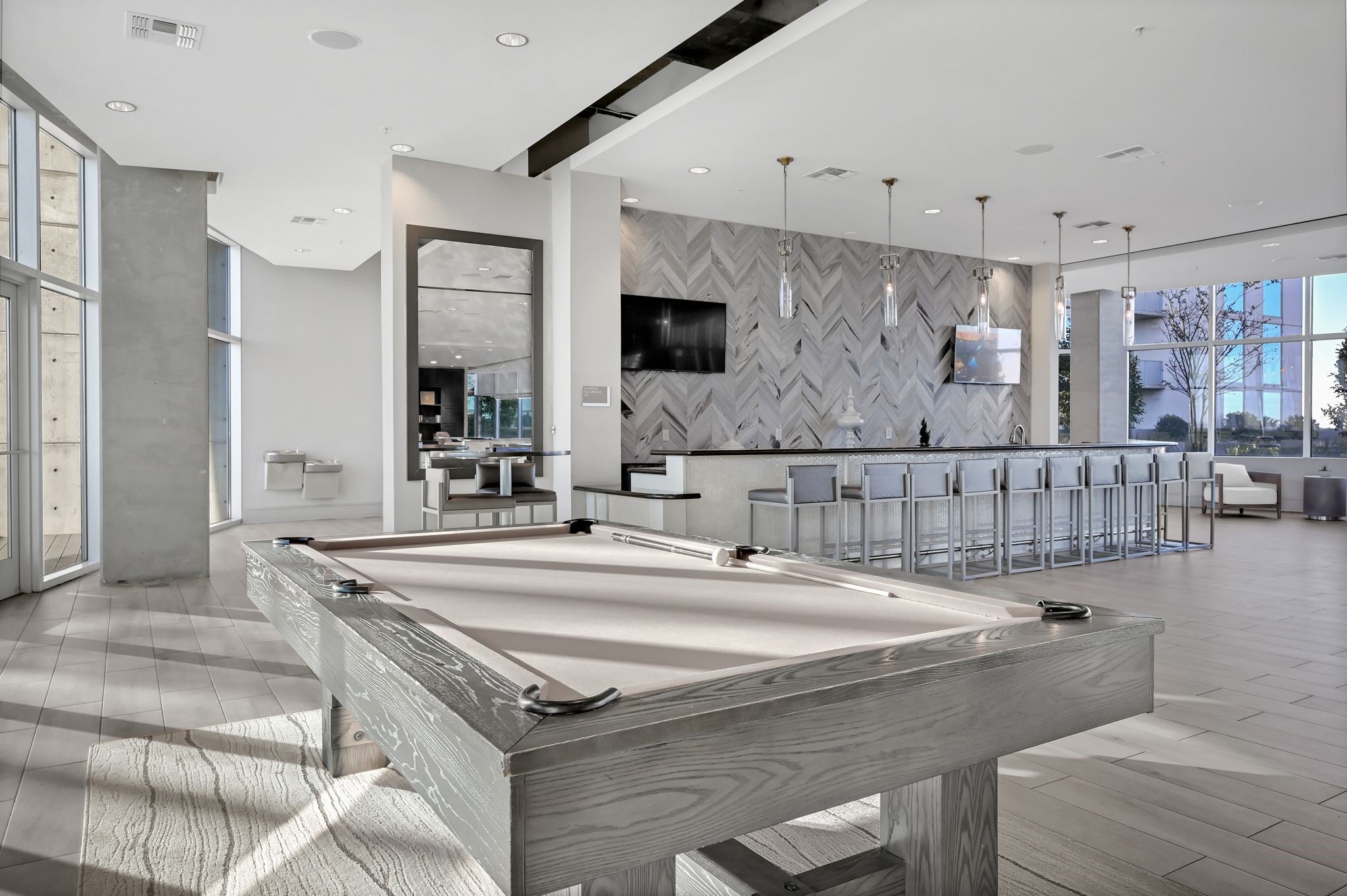 5925 Almeda Road, Unit 11317 Houston, TX 77004 - Photo 29 of 38 a bathroom with a sink a large mirror and a shower