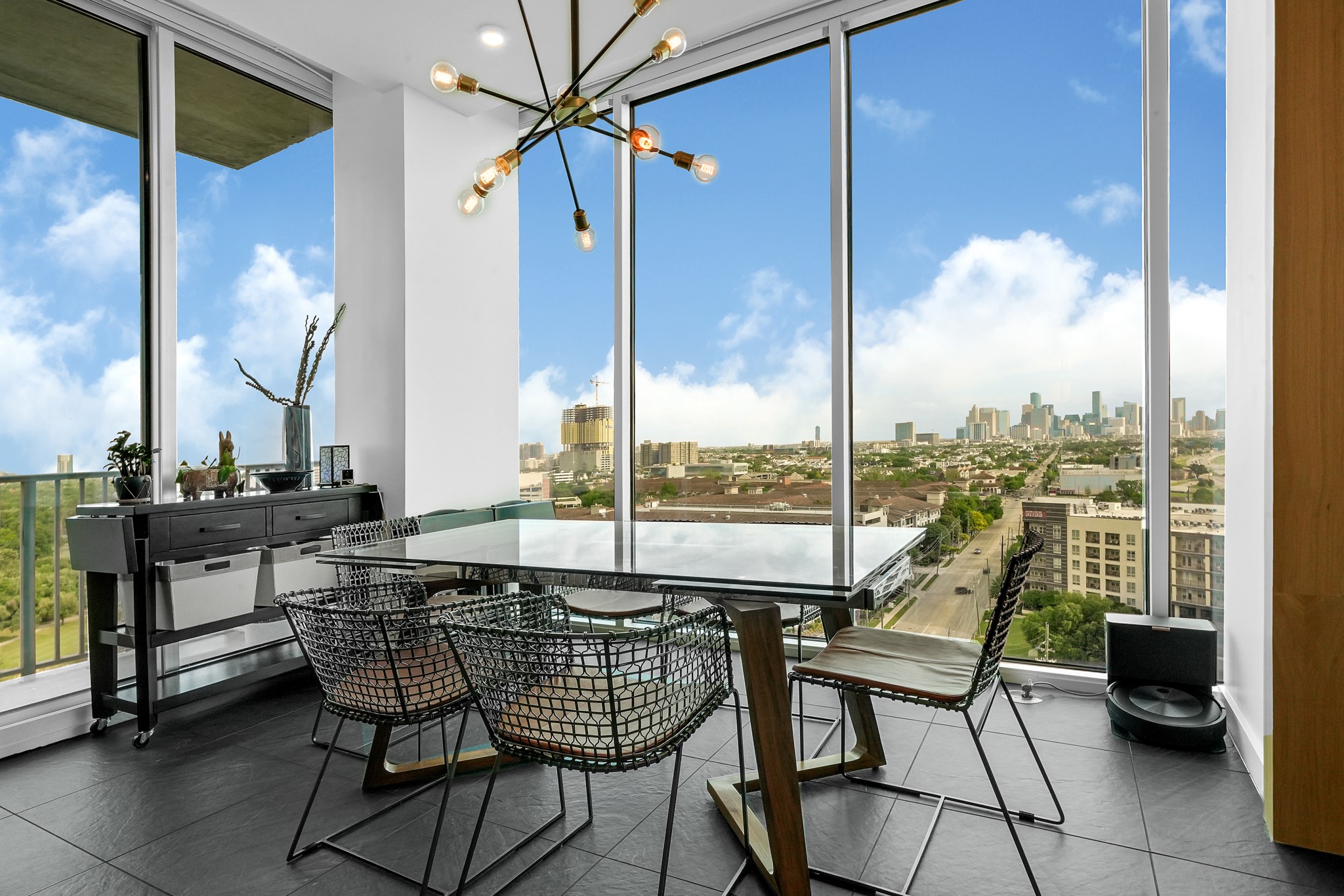 5925 Almeda Road, Unit 11317 Houston, TX 77004 - Photo 10 of 38 a view of a dining room with furniture window and outside view
