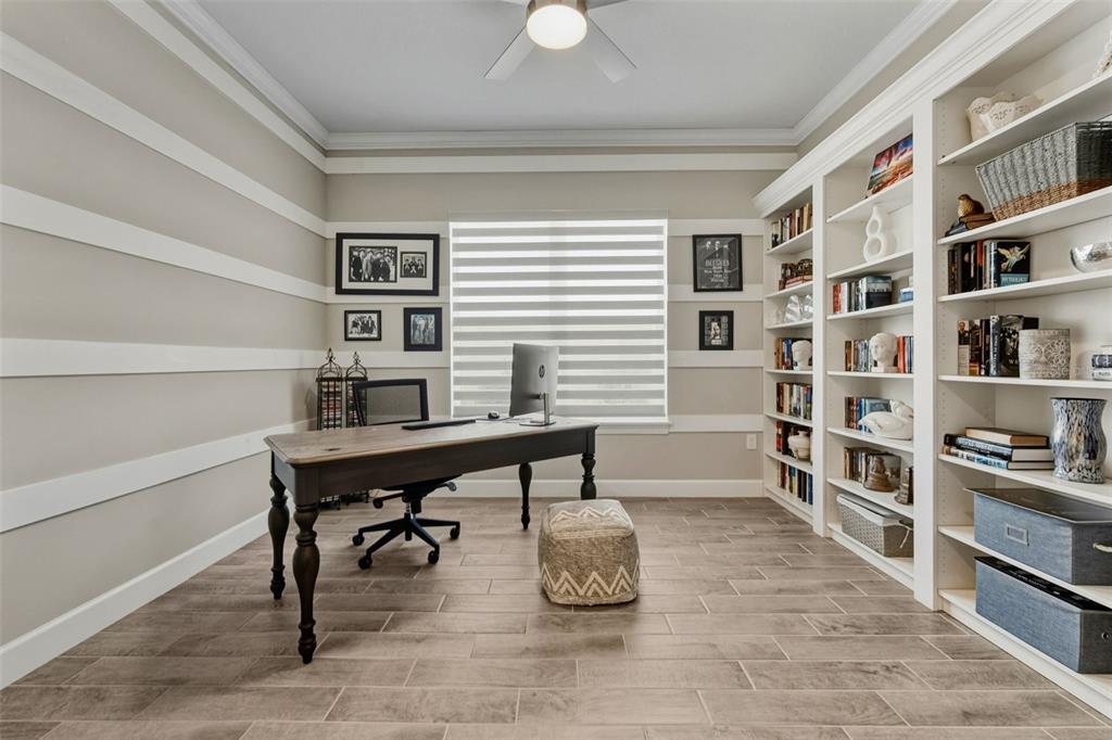 4951 Freccia Loop Wesley Chapel, FL 33543 - Photo 33 of 43 a view of a workspace with furniture