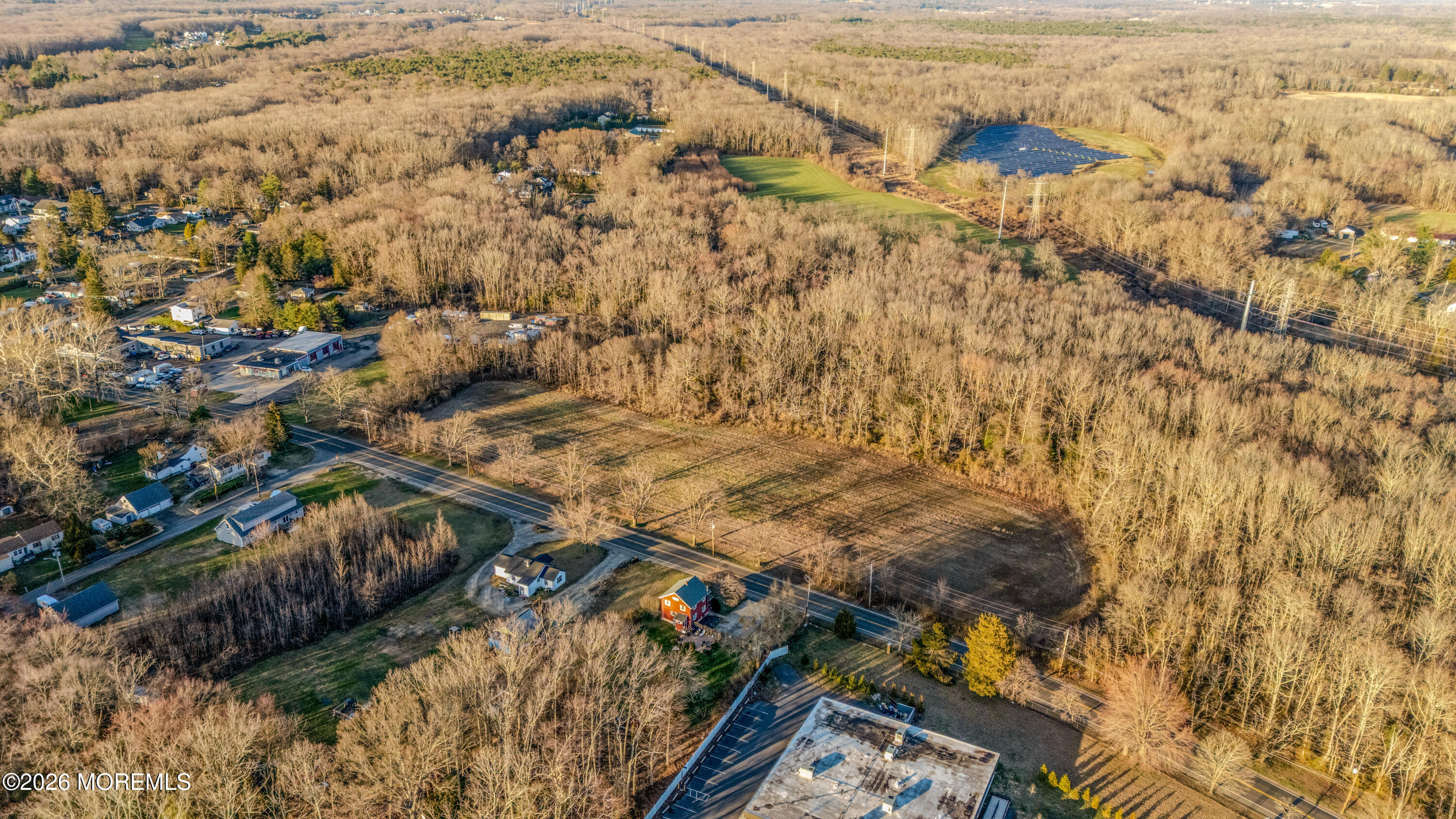 0 Adelphia-Farmingdale Road Farmingdale, NJ 07727 - Photo 12 of 15 a view of residential houses with wooden fence