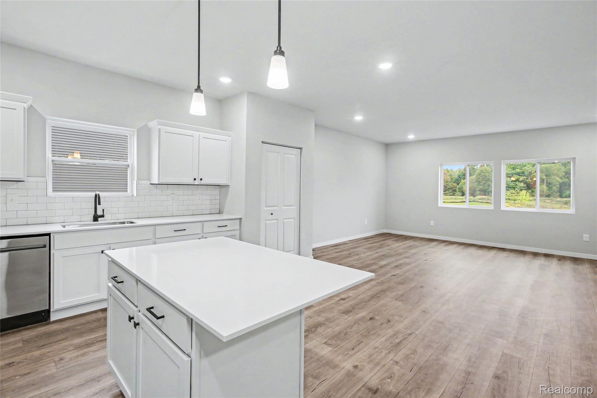 1210 Lockes Street Howell, MI 48843 - Photo 5 of 37 Upper level features an abundance of natural lighting