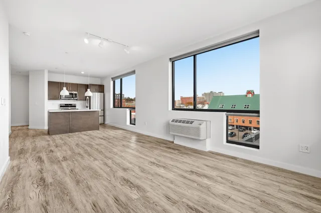 a view of a kitchen with a window