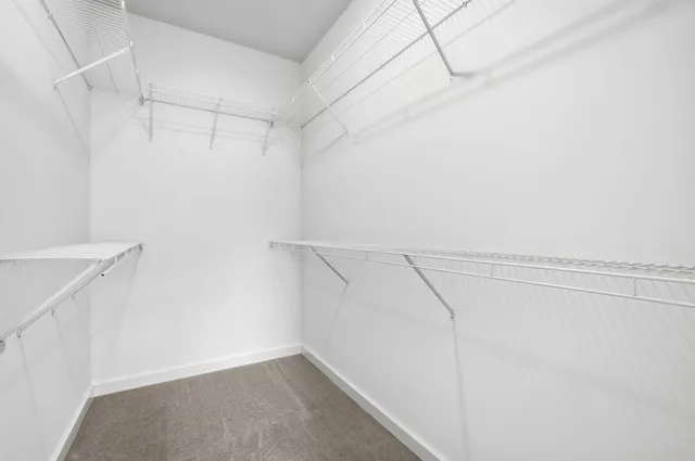 a view of a room with racks on the wall