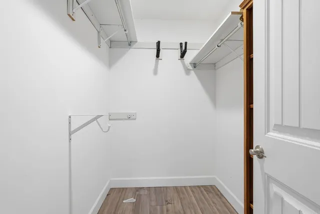 a view of a room with racks on the wall