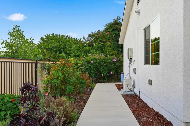 a backyard of a house with lots of green space