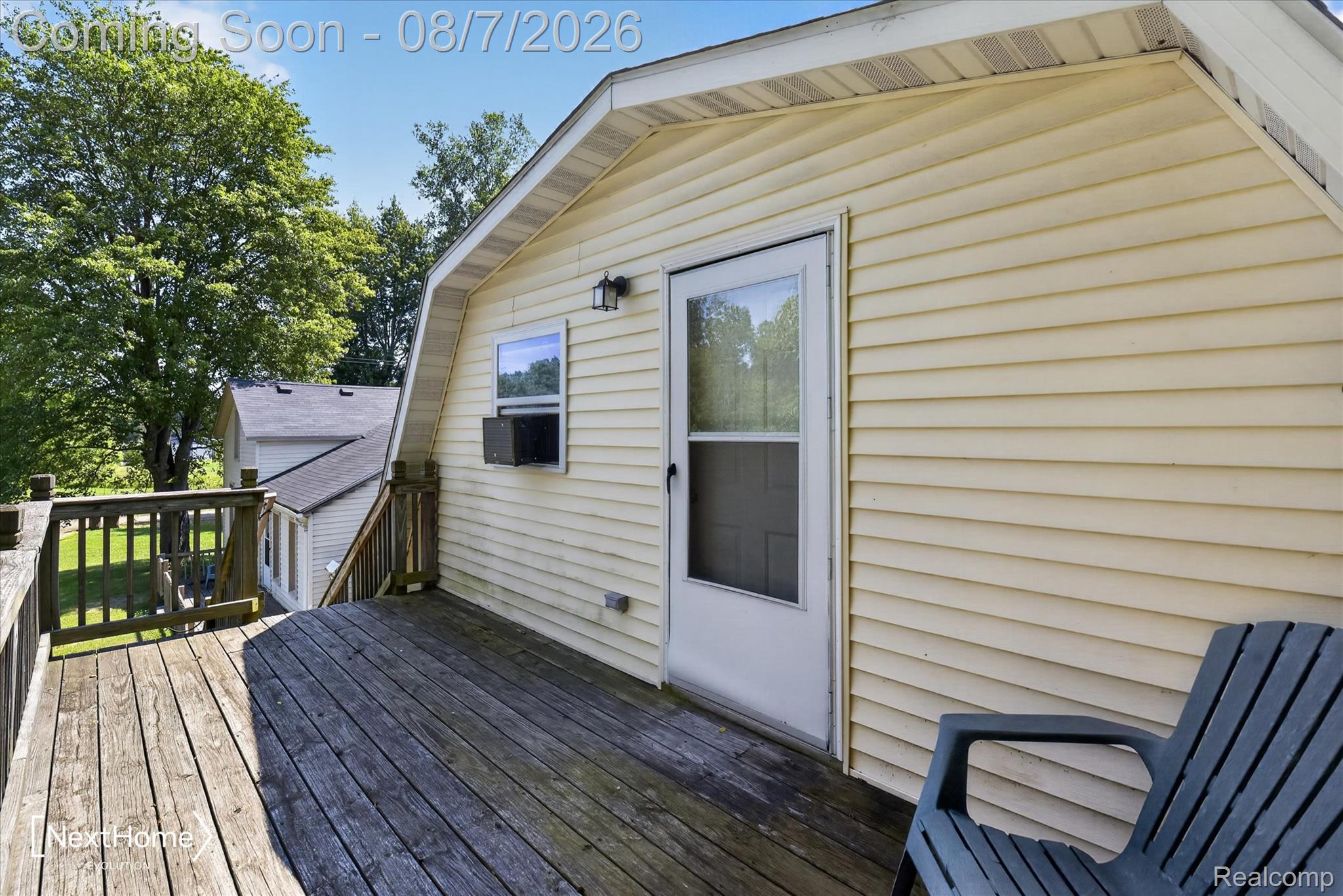 23740 Carleton West Road Belleville, MI 48111 - Photo 39 of 58 Exterior deck with wood decking and railings