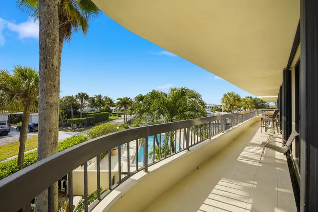 a view of balcony with furniture