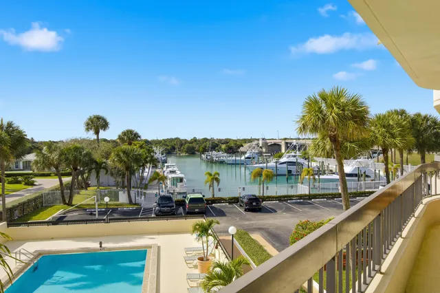 a view of a swimming pool with a patio