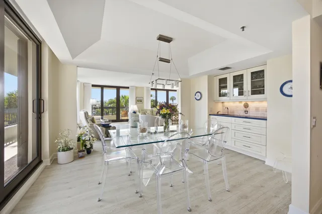 a view of a living room and dining room