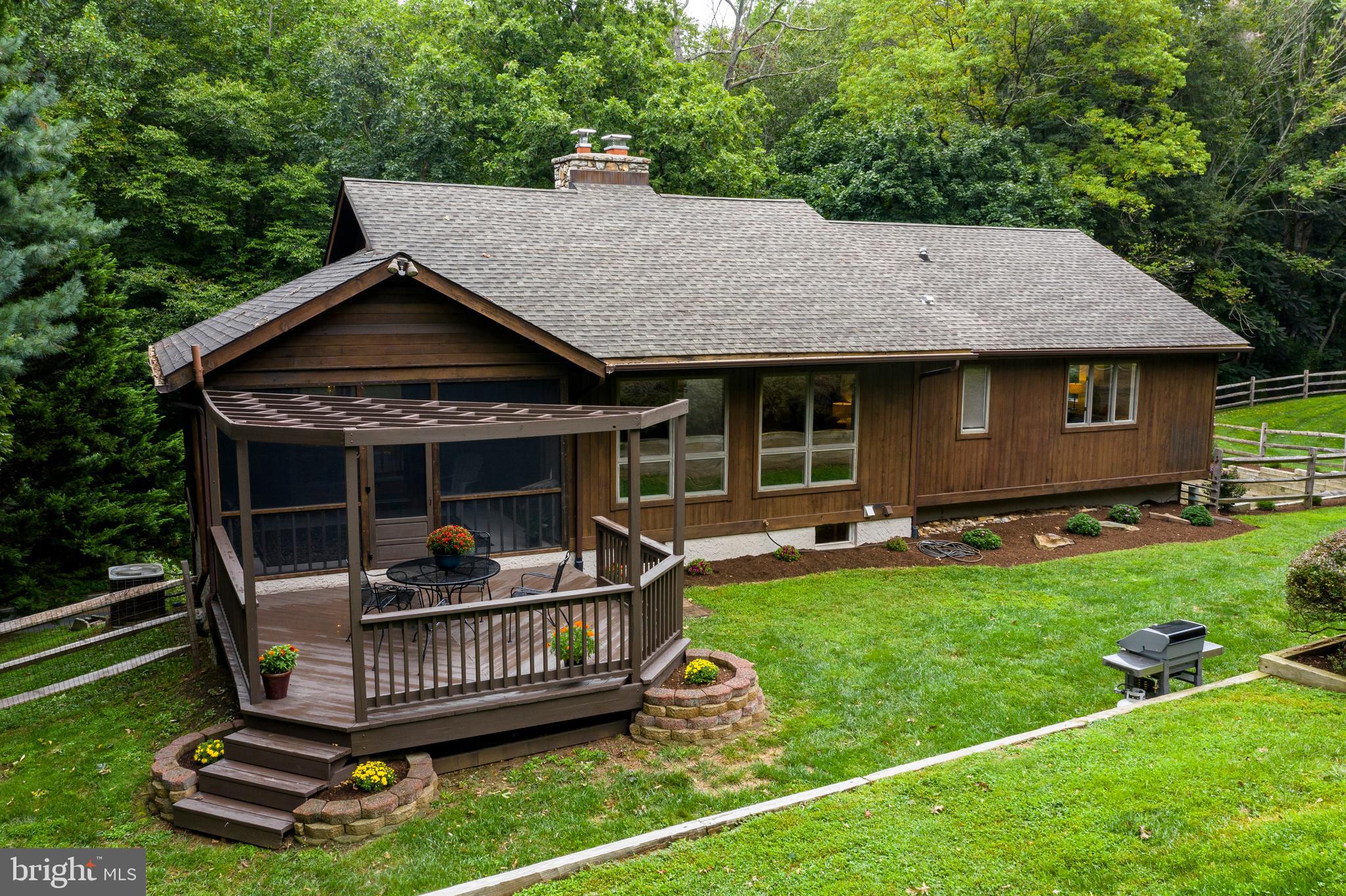 98 Birmingham Road West Chester, PA 19382 - Photo 12 of 43 Rear View of Pergola, Deck and home