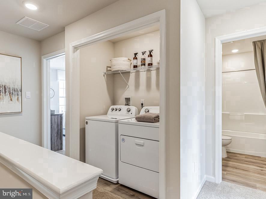 260 Macoun Way Glassboro, NJ 08028 - Photo 11 of 11 Modern laundry nook with sleek design.