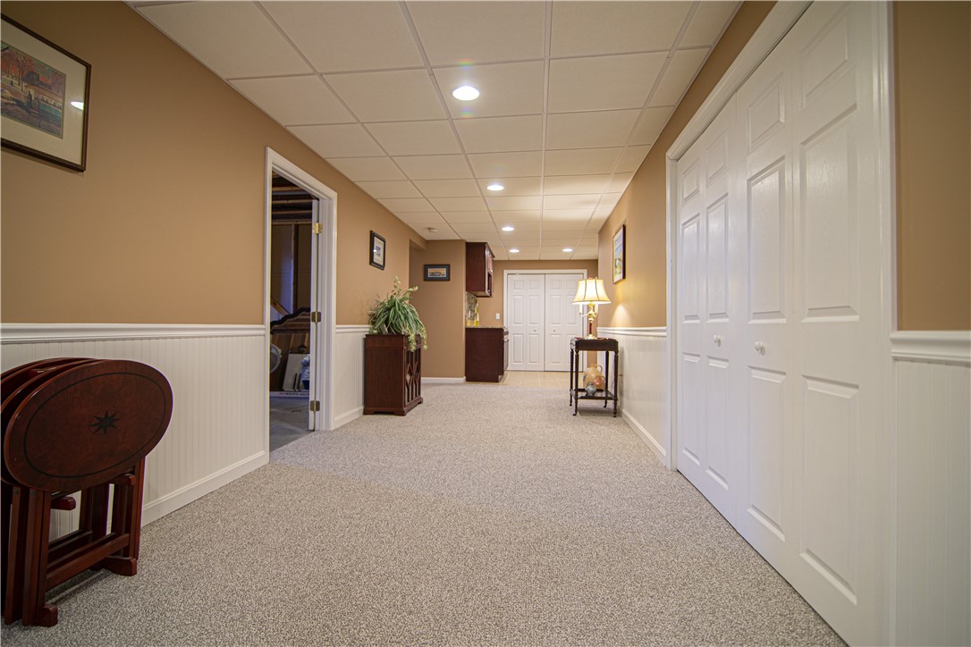 4 Asylum Road, Unit H North Providence, RI 02904 - Photo 35 of 45 Hall from Kitchenette Area & Bathroom to Recreation, Utility & Storage Rooms. New, Recently Installed Carpets