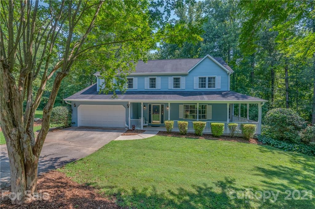 163 Fairforest Drive Rutherfordton, NC 28139 - Photo 1 of 48 a front view of a house with a yard and green space
