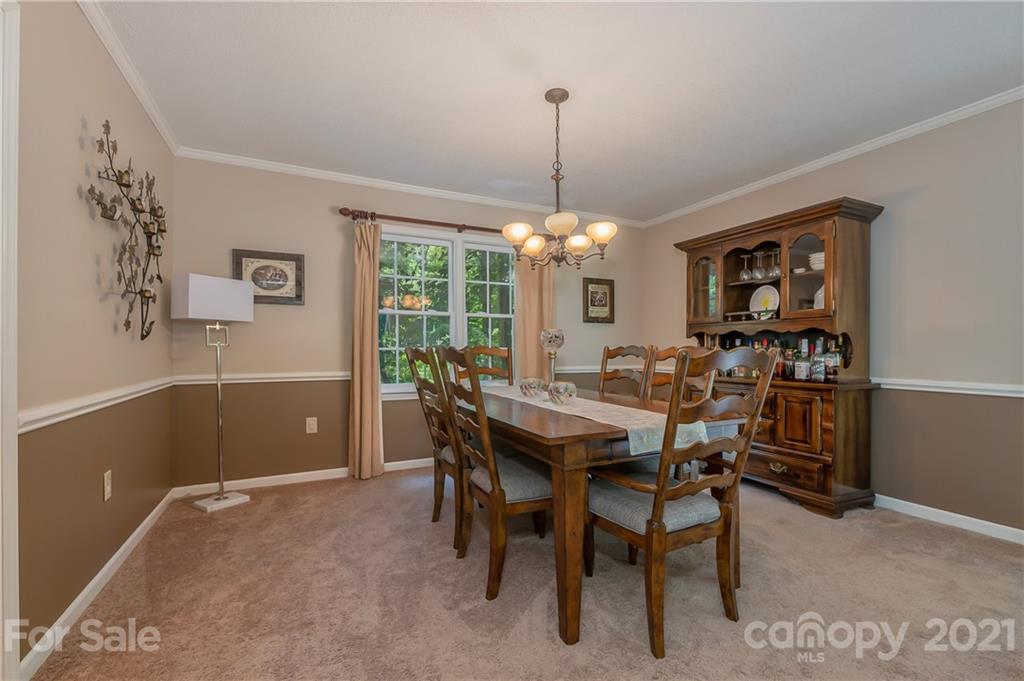 163 Fairforest Drive Rutherfordton, NC 28139 - Photo 14 of 48 a view of a dining room with furniture window and outside view