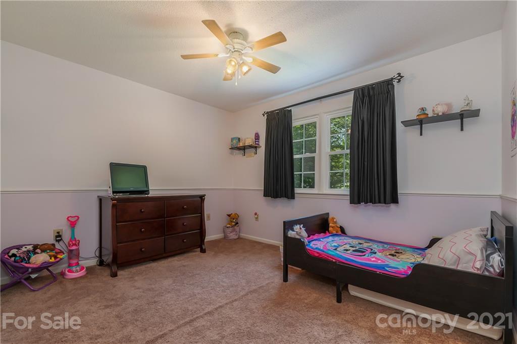 163 Fairforest Drive Rutherfordton, NC 28139 - Photo 26 of 48 a bedroom with a bed and a window