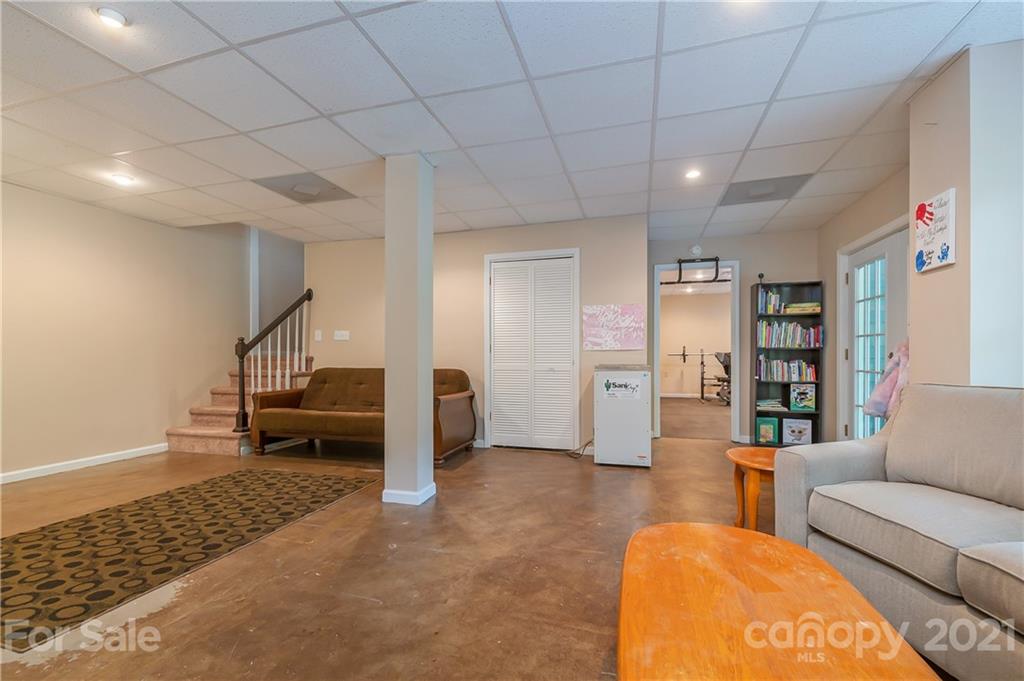 163 Fairforest Drive Rutherfordton, NC 28139 - Photo 29 of 48 a living room with furniture and wooden floor