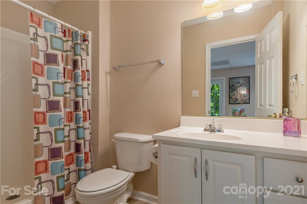 163 Fairforest Drive Rutherfordton, NC 28139 - Photo 31 of 48 a bathroom with a sink toilet and shower