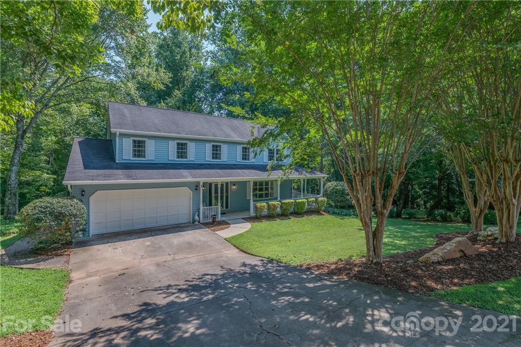163 Fairforest Drive Rutherfordton, NC 28139 - Photo 48 of 48 a front view of a house with a garden and trees