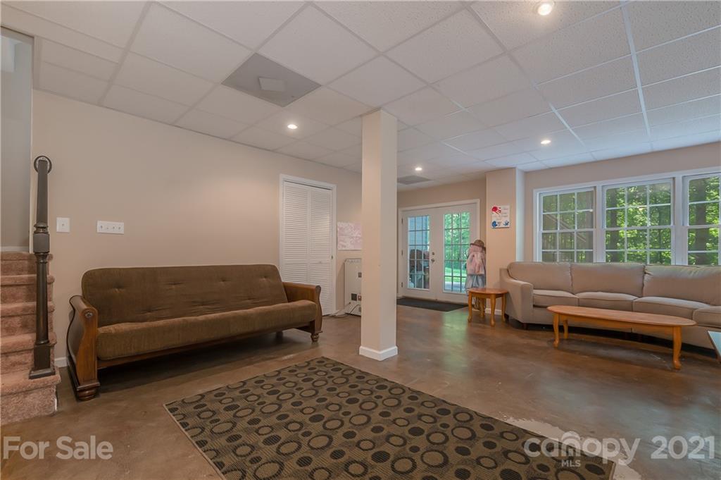 163 Fairforest Drive Rutherfordton, NC 28139 - Photo 10 of 48 a living room with furniture and a large window