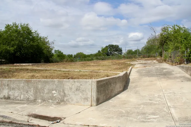 a view of an outdoor space and swimming pool