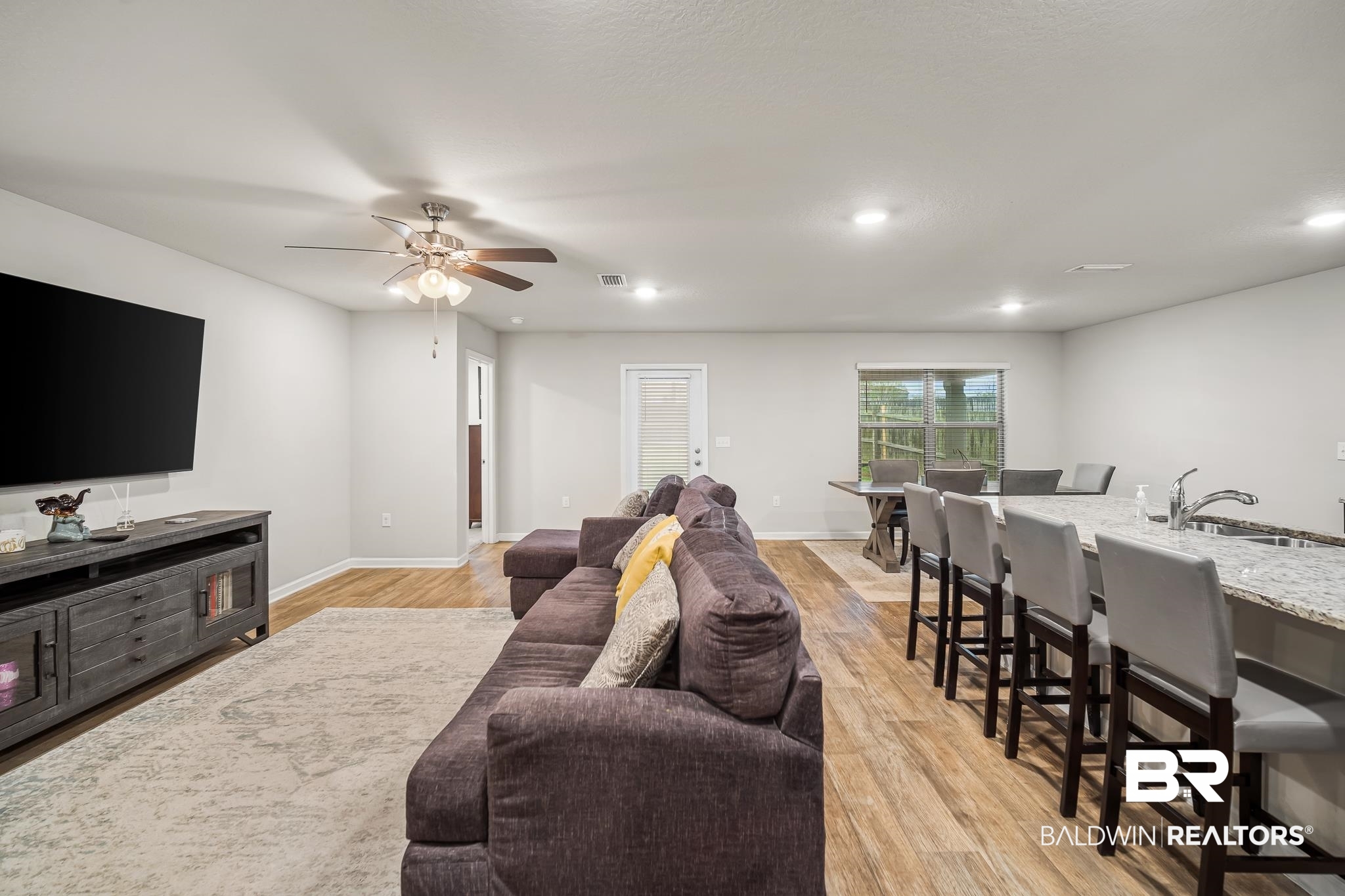 10074 Brodick Loop Daphne, AL 36527 - Photo 4 of 23 Living Room/Kitchen