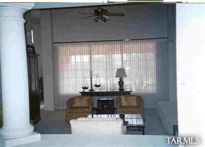 1 East Desert Sky Road, Unit 15 Tucson, AZ 85737 - Photo 3 of 6 a living room with furniture and a large window