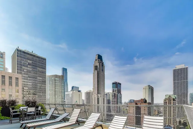 a view of city with tall buildings