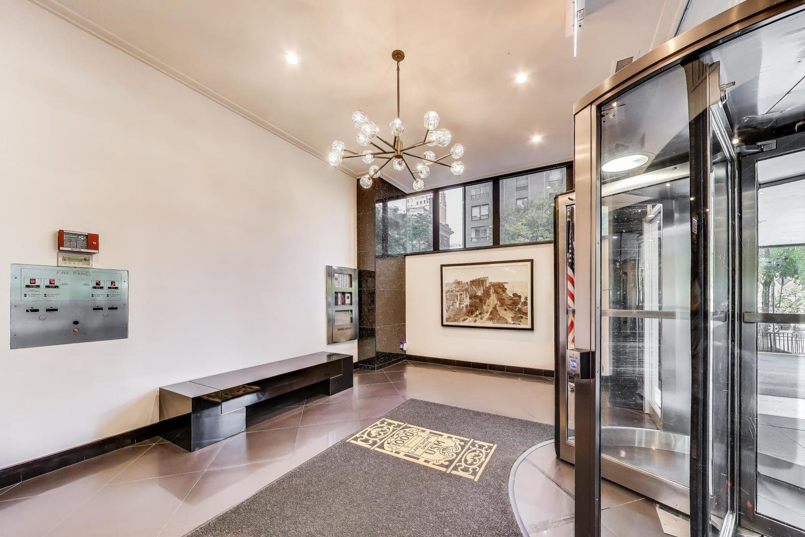 1000 North Lake Shore Plaza, Unit 804 Chicago, IL 60611 - Photo 24 of 25 a view of a room with gym equipment