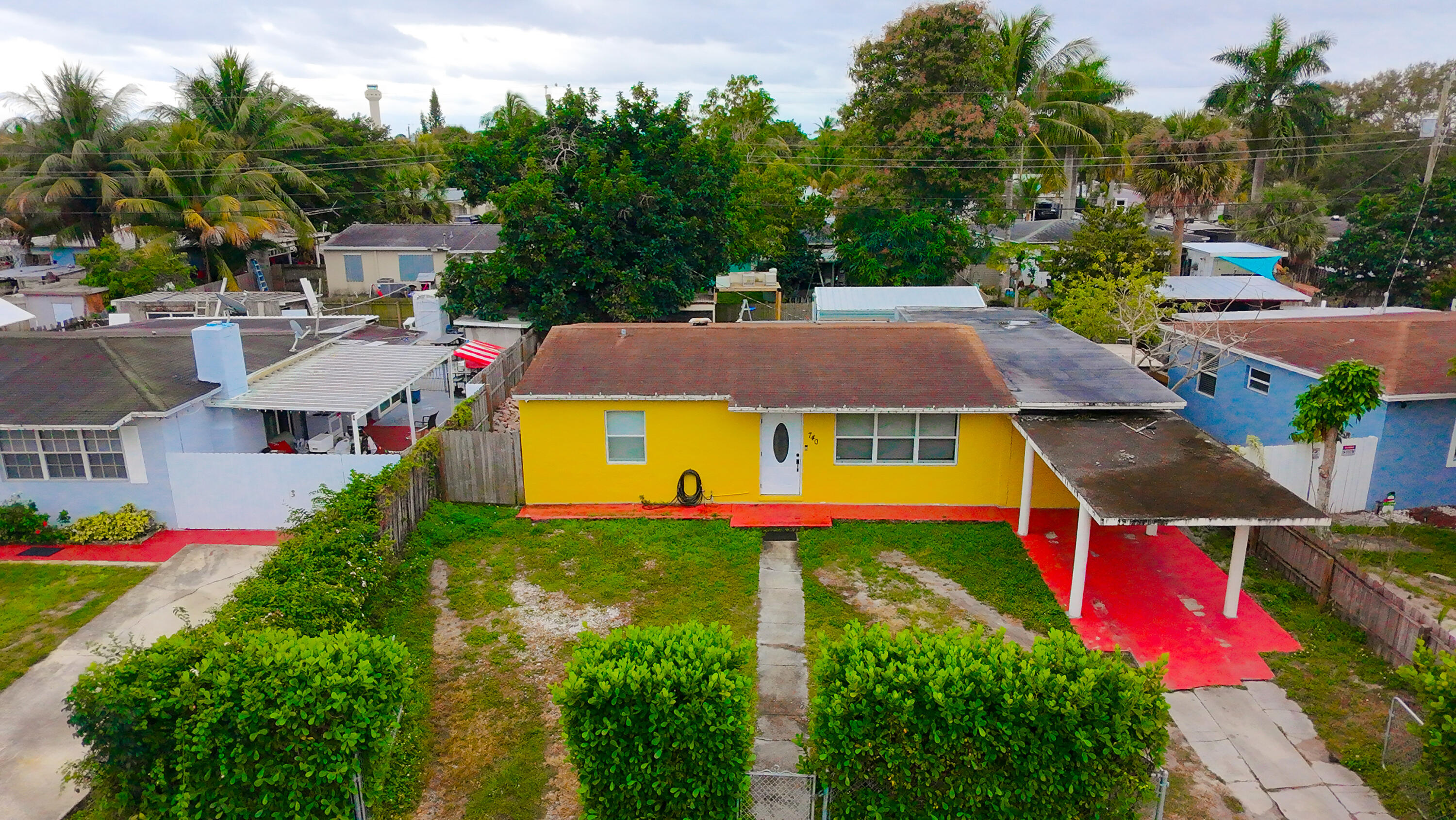 740 Aspen Road West Palm Beach, FL 33409 - Photo 27 of 34 an aerial view of residential houses with yard and swimming pool